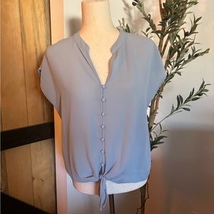 Light blue blouse shoe sleeve tie in the front size small